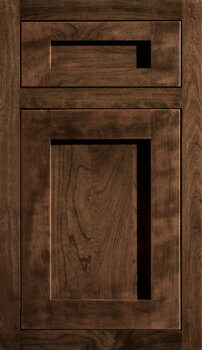 A dark stained inset door style with a shaker look.