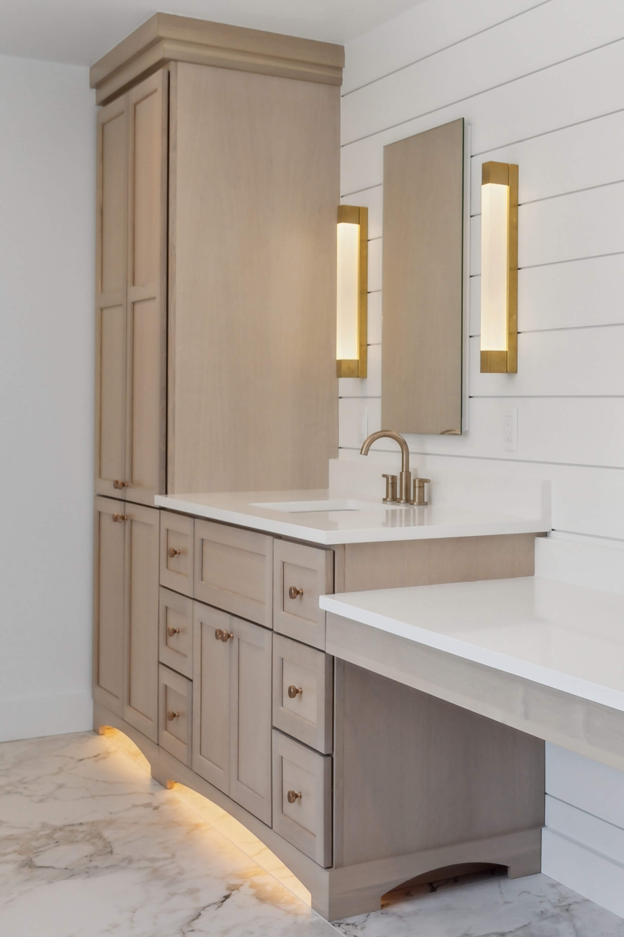 A modern farmhouse bathroom design with a furniture styled vanity in a light stained quarter-sawn white oak finish.